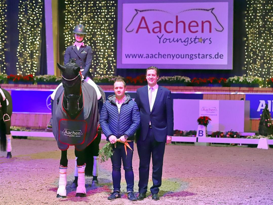 The winner Micky Schelstraete with Patrick Reinartz (Fa. Horsetrucks Terhorst) and member of the ALRV Supervisory Board Wolfgang Mainz.